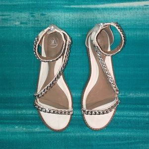 White Sandals with Metal beaded ankle straps.